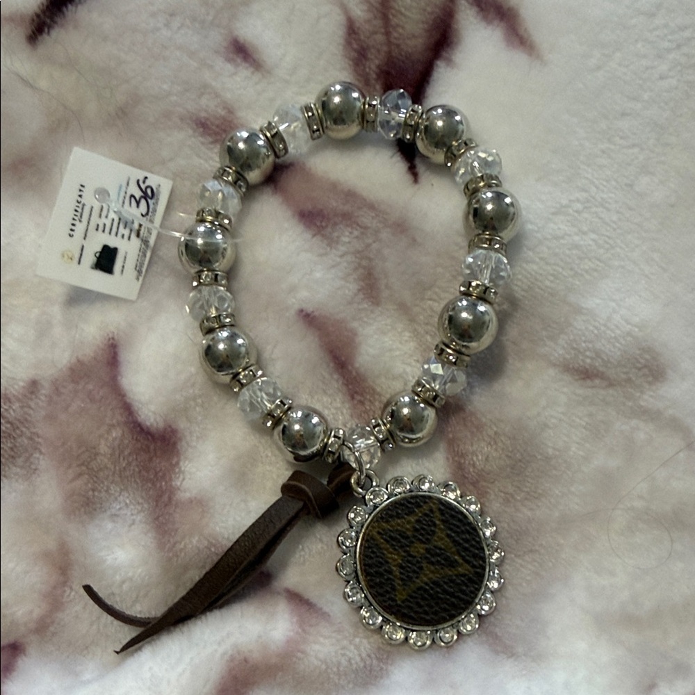 Silver and Brown Beaded Bracelet with Charm